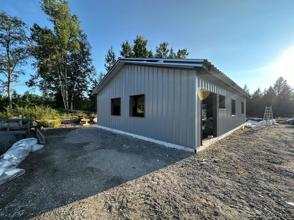 Pre-engineered steel shop building on a rural site